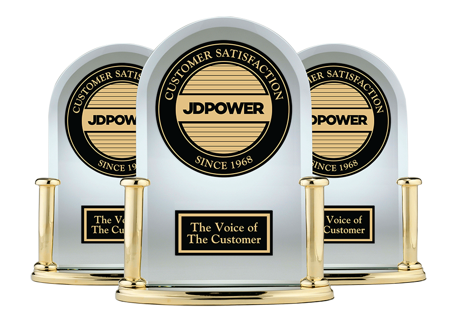 Three identical JD Power awards made of clear glass with gold bases and text. Each award features the JD Power logo and the phrase 'The Voice of The Customer'.